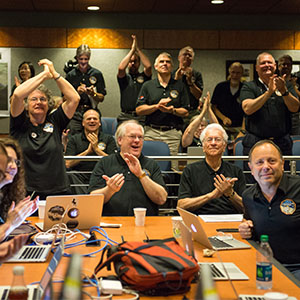 Part of the New Horizons team celebrating the spacecraft's flyby of Pluto.